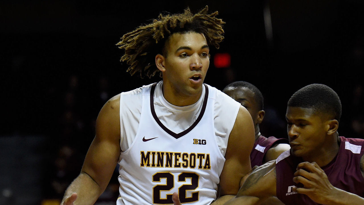 MINNEAPOLIS, MN - NOVEMBER 21: Evan Wiley #24 of the Alabama A&M Bulldogs knocks the ball away from Reggie Lynch #22 of the Minnesota Golden Gophers during the second half of the game on November 21, 2017 at Williams Arena in Minneapolis, Minnesota. The Golden Gophers defeated the Bulldogs 100-57.