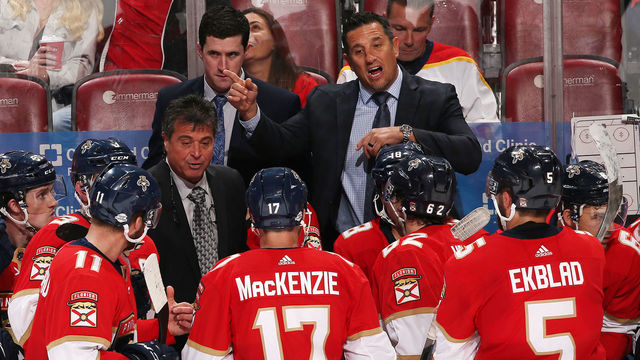 SUNRISE, FL - FEBRUARY 6: Florida Panthers Head coach Bob Boughner (rear right) of the Florida Panthers directs the players during a break in action against Vancouver Canucks at the BB&T Center on February 6, 2018 in Sunrise, Florida. The Panthers defeated the Canucks 3-1.