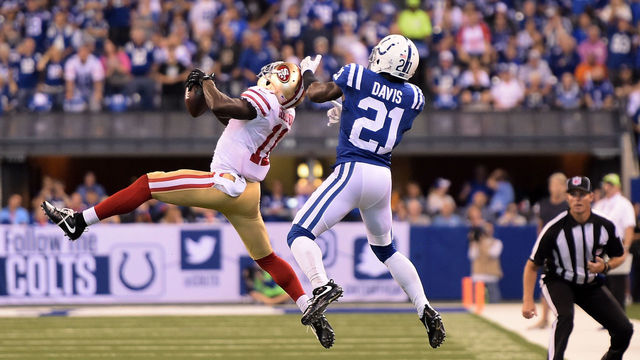INDIANAPOLIS, IN - OCTOBER 08: Marquise Goodwin #11 of the San Francisco 49ers catches a pass in front of Vontae Davis #21 of the Indianapolis Colts during the second quarter of a game at Lucas Oil Stadium on October 8, 2017 in Indianapolis, Indiana.