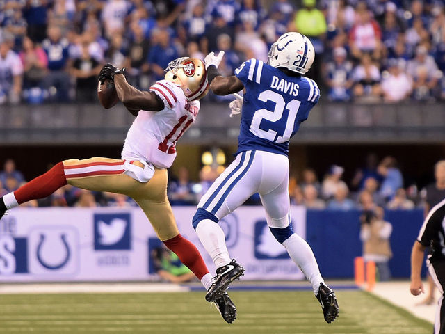 INDIANAPOLIS, IN - OCTOBER 08: Marquise Goodwin #11 of the San Francisco 49ers catches a pass in front of Vontae Davis #21 of the Indianapolis Colts during the second quarter of a game at Lucas Oil Stadium on October 8, 2017 in Indianapolis, Indiana.