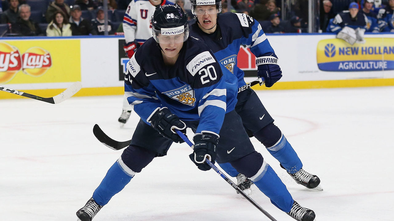 BUFFALO, NY - DECEMBER 31: Eeli Tolvanen #20 of Finland skates up ice with the puck in the second period against the United States during the IIHF World Junior Championship at KeyBank Center on December 31, 2017 in Buffalo, New York.