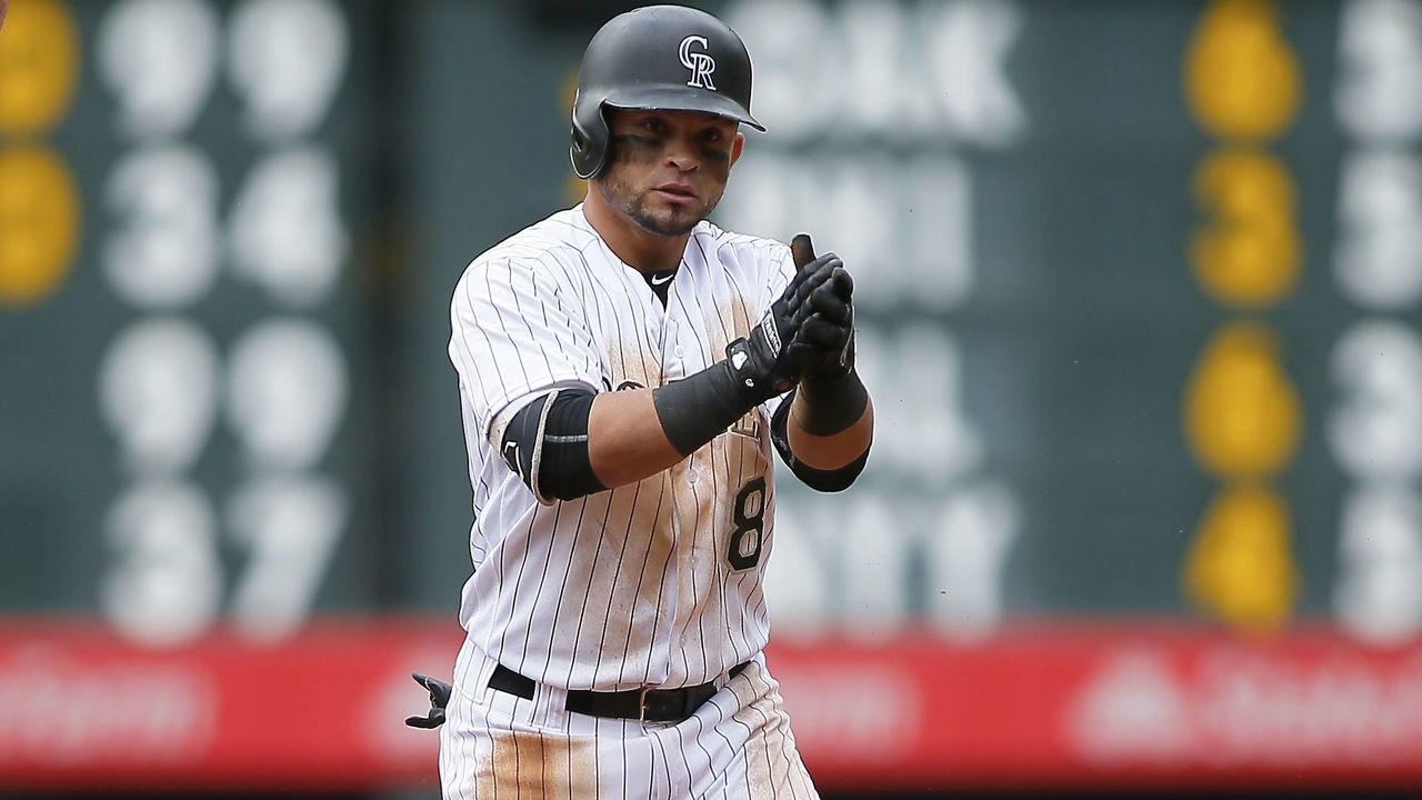 DENVER, CO - SEPTEMBER 17: Gerardo Parra #8 of the Colorado Rockies stands at second base following a base hit during a regular season MLB game between the Colorado Rockies and the visiting San Diego Padres at Coors Field on September 17, 2017 in Denver, Colorado.