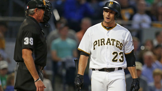 PITTSBURGH, PA - SEPTEMBER 06: David Freese #23 of the Pittsburgh Pirates argues a call with umpire Paul Nauert #39 against the Chicago Cubs at PNC Park on September 6, 2017 in Pittsburgh, Pennsylvania.