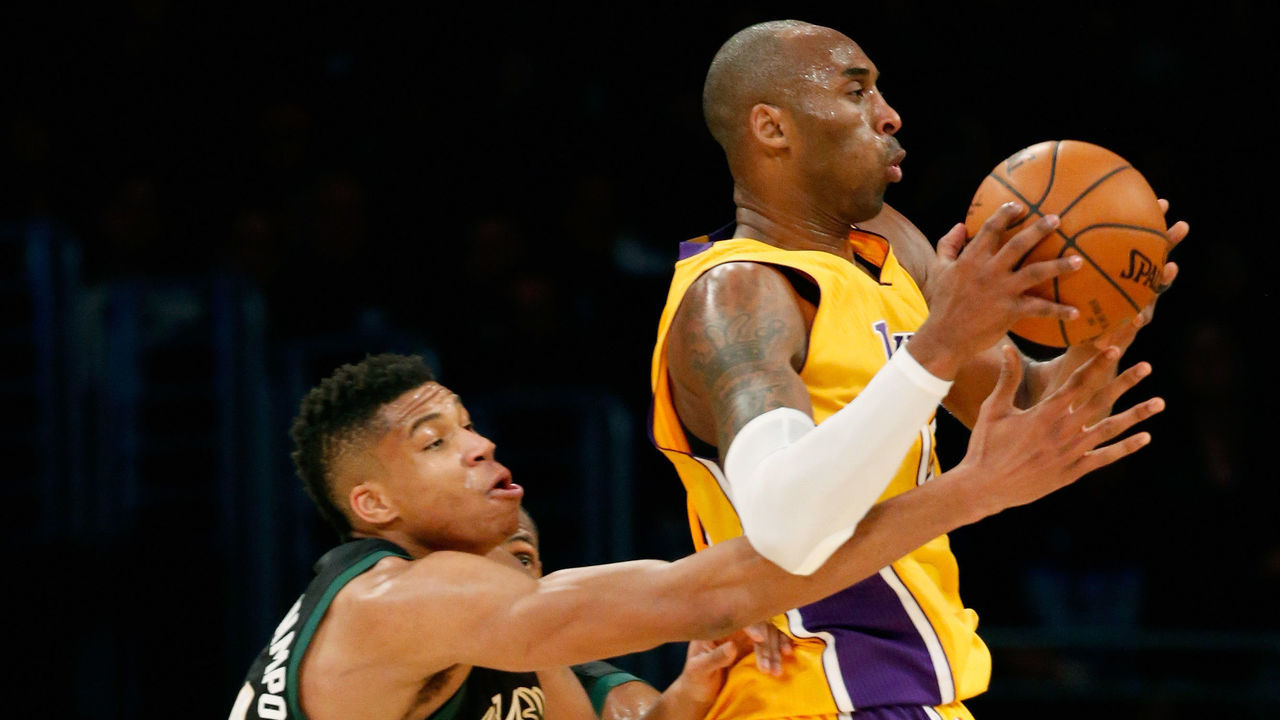 LOS ANGELES, CA - DECEMBER 15: Kobe Bryant #24 of the Los Angeles Lakers dribbles past Giannis Antetokounmpo #34 of the Milwaukee Bucks during the second half of a game at Staples Center on December 15, 2015 in Los Angeles, California.