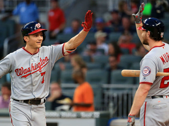 ATLANTA, GA - SEPTEMBER 20: Trea Turner #7 celebrates a home run with Daniel Murphy #20 of the Washington Nationals during the first inning against the Atlanta Braves at SunTrust Park on September 20, 2017 in Atlanta, Georgia.