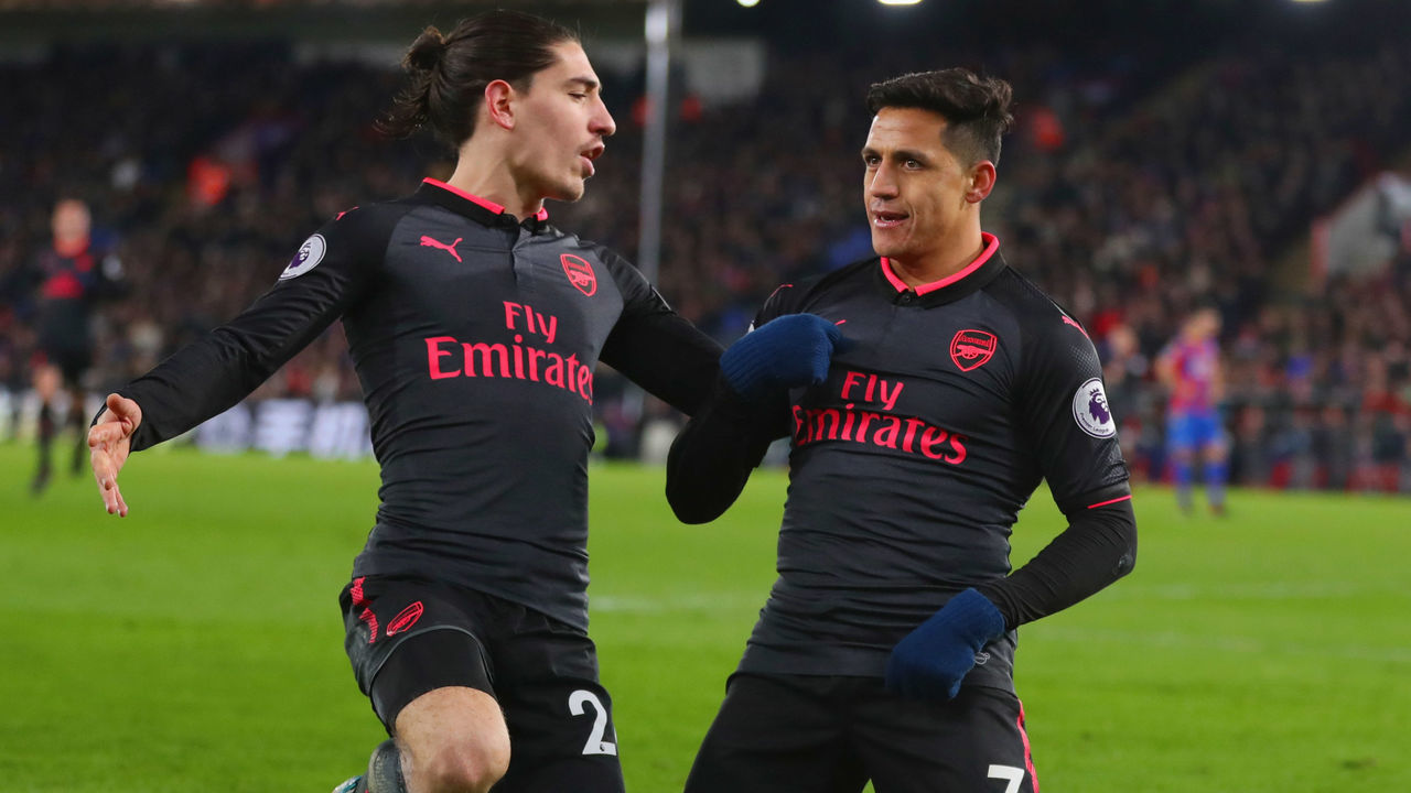 LONDON, ENGLAND - DECEMBER 28: Alexis Sanchez of Arsenal celebrates as he scores their third goal with Hector Bellerin during the Premier League match between Crystal Palace and Arsenal at Selhurst Park on December 28, 2017 in London, England.
