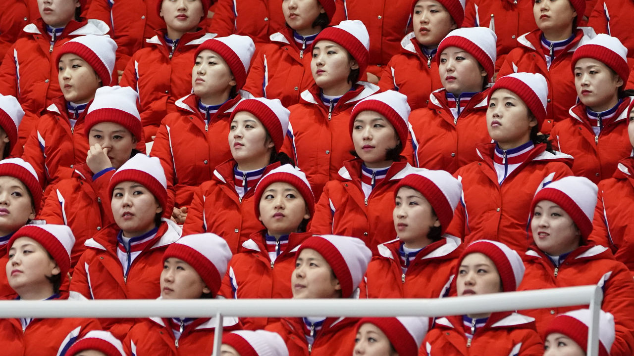 PYEONGCHANG-GUN, SOUTH KOREA - FEBRUARY 14: North Korean cheerleaders attend the Pair Skating Short Program on day five of the PyeongChang 2018 Winter Olympics at Gangneung Ice Arena on February 14, 2018 in Gangneung, South Korea.