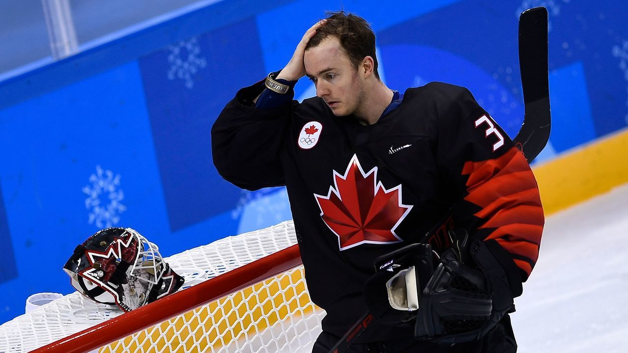 Canada's Ben Scrivens leaves the rink during the final period of the men's preliminary round ice hockey match between Canada and Czech Republic during the Pyeongchang 2018 Winter Olympic Games at the Gangneung Hockey Centre in Gangneung on February 17, 2018. / AFP PHOTO / Brendan Smialowski