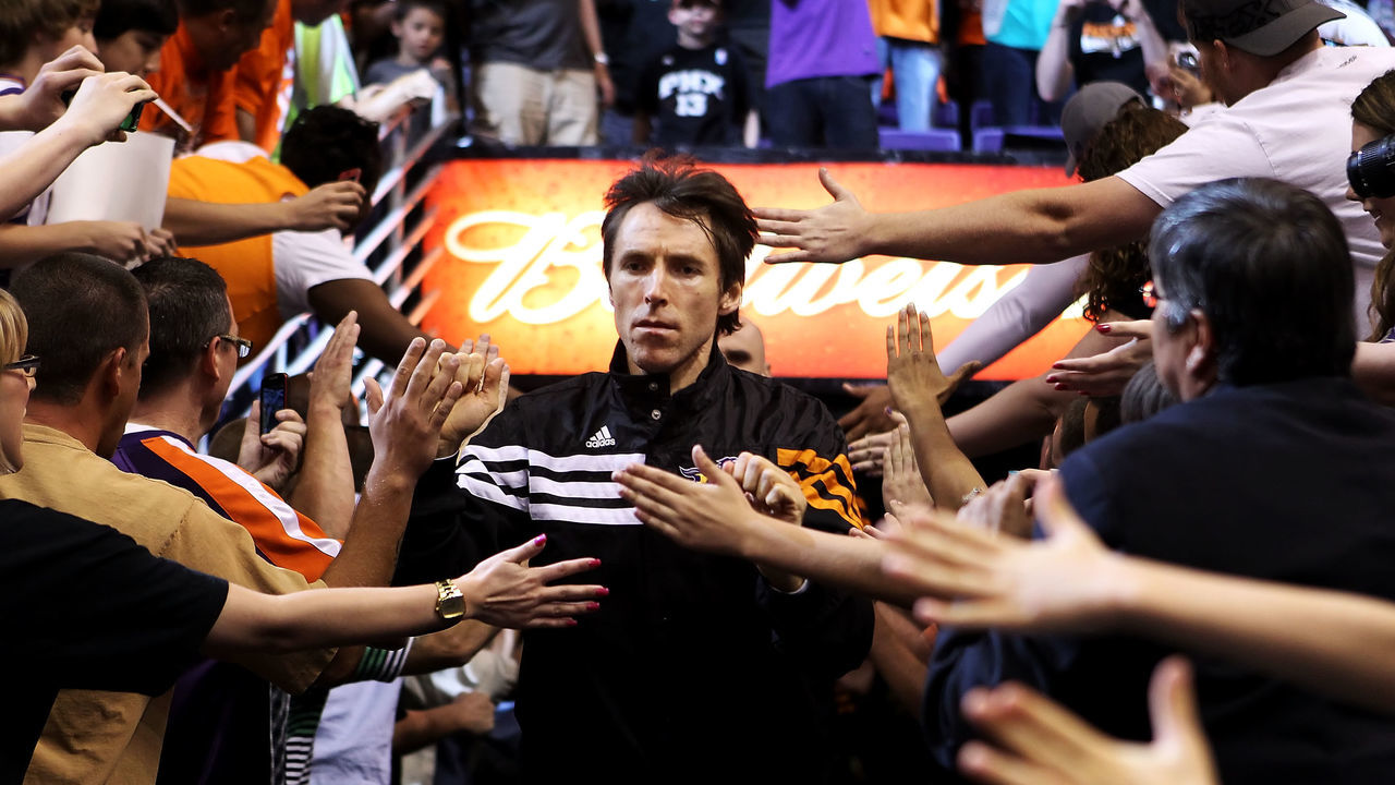 PHOENIX, AZ - APRIL 25: Steve Nash #13 of the Phoenix Suns runs out onto the court before the NBA game against the San Antonio Spurs at US Airways Center on April 25, 2012 in Phoenix, Arizona.