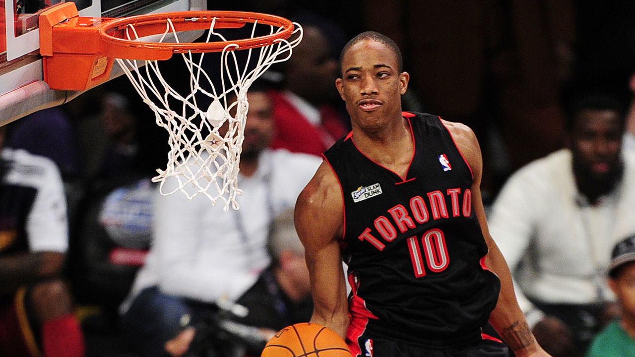DeMar DeRozan of the Toronto Raptors shoots in the Slam Dunk Contest during NBA All-Star weekend in Los Angeles February 19, 2011. AFP PHOTO / Robyn Beck