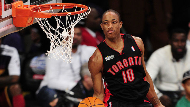 DeMar DeRozan of the Toronto Raptors shoots in the Slam Dunk Contest during NBA All-Star weekend in Los Angeles February 19, 2011. AFP PHOTO / Robyn Beck