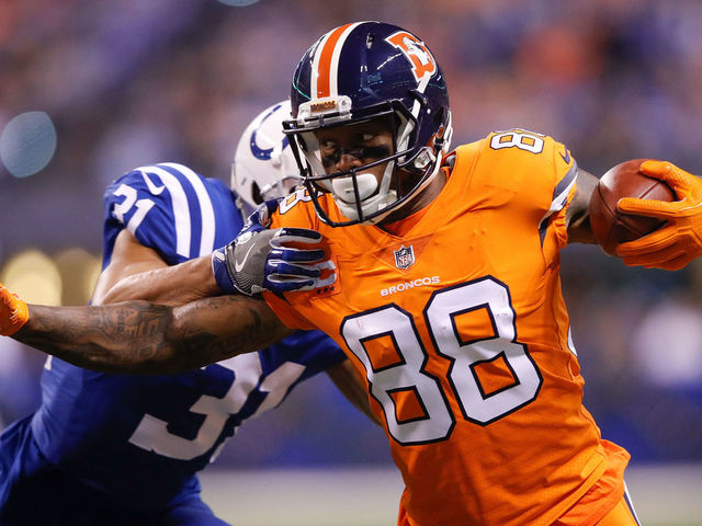 INDIANAPOLIS, IN - DECEMBER 14: Demaryius Thomas #88 of the Denver Broncos pushes off a tackle from Quincy Wilson #31 of the Indianapolis Colts during the first half at Lucas Oil Stadium on December 14, 2017 in Indianapolis, Indiana.