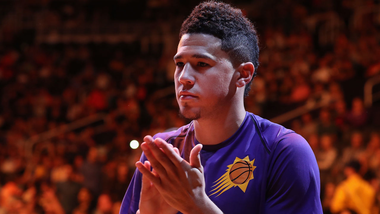 PHOENIX, AZ - OCTOBER 20: Devin Booker #1 of the Phoenix Suns stands on the court before the NBA game against the Los Angeles Lakers at Talking Stick Resort Arena on October 20, 2017 in Phoenix, Arizona. The Lakers defeated the Suns 132-130.