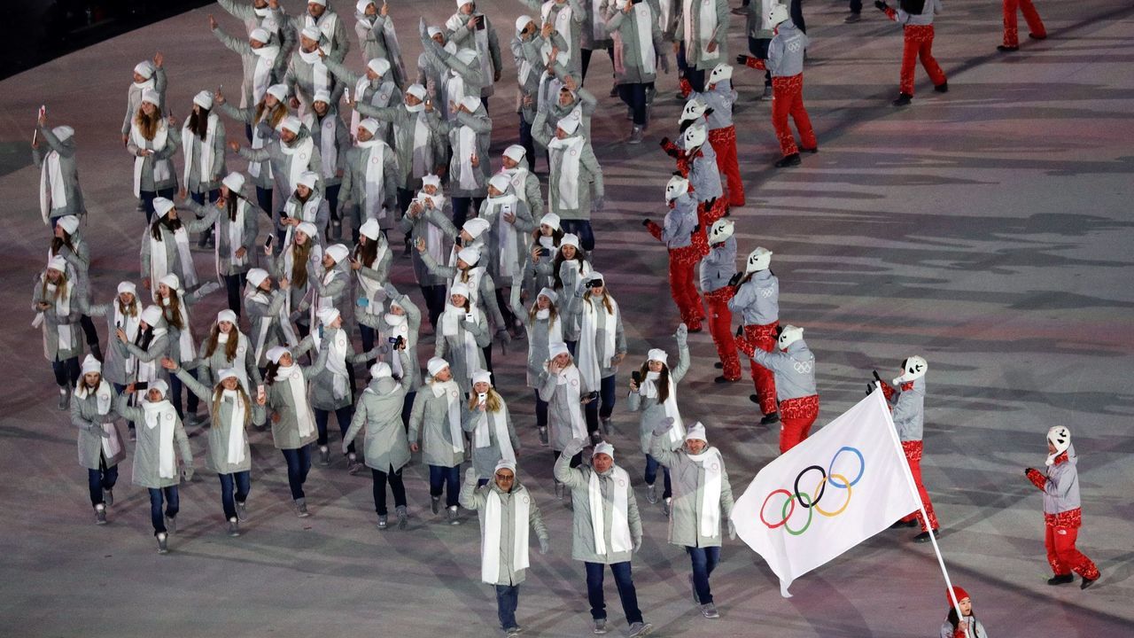 The Olympic Athletes from Russia delegation parades during the opening ceremony of the Pyeongchang 2018 Winter Olympic Games at the Pyeongchang Stadium on February 9, 2018. / AFP PHOTO / POOL / David J.PHILIP