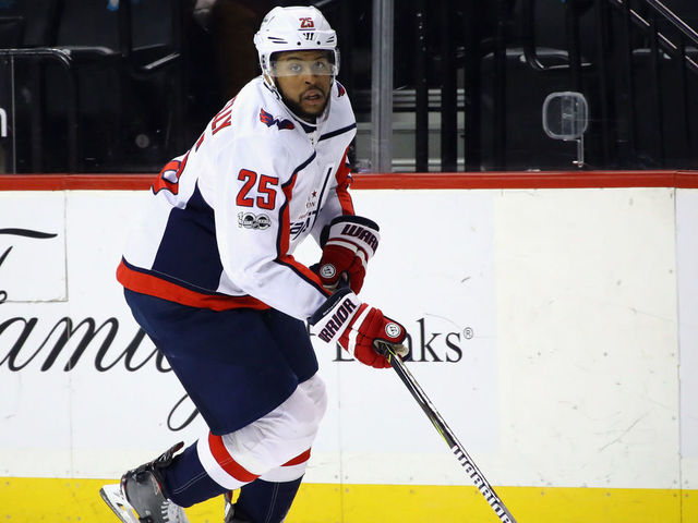 NEW YORK, NY - DECEMBER 11: Devante Smith-Pelly #25 of the Washington Capitals skates against the New York Islanders at the Barclays Center on December 11, 2017 in the Brooklyn borough of New York City. The Islanders defeated the Capitals 3-1.