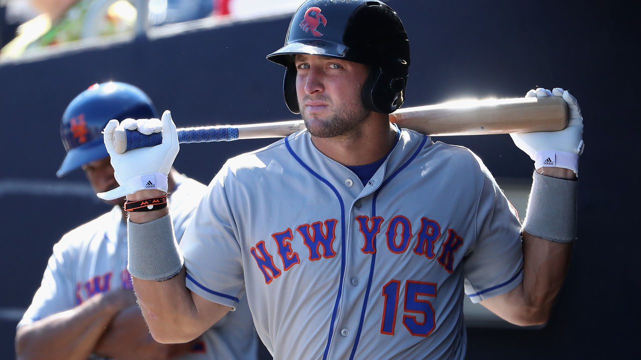 PEORIA, AZ - OCTOBER 13: Tim Tebow #15 (New York Mets) of the Scottsdale Scorpions warms up in the dugout during the Arizona Fall League game against the Peoria Javelinas at Peoria Stadium on October 13, 2016 in Peoria, Arizona.