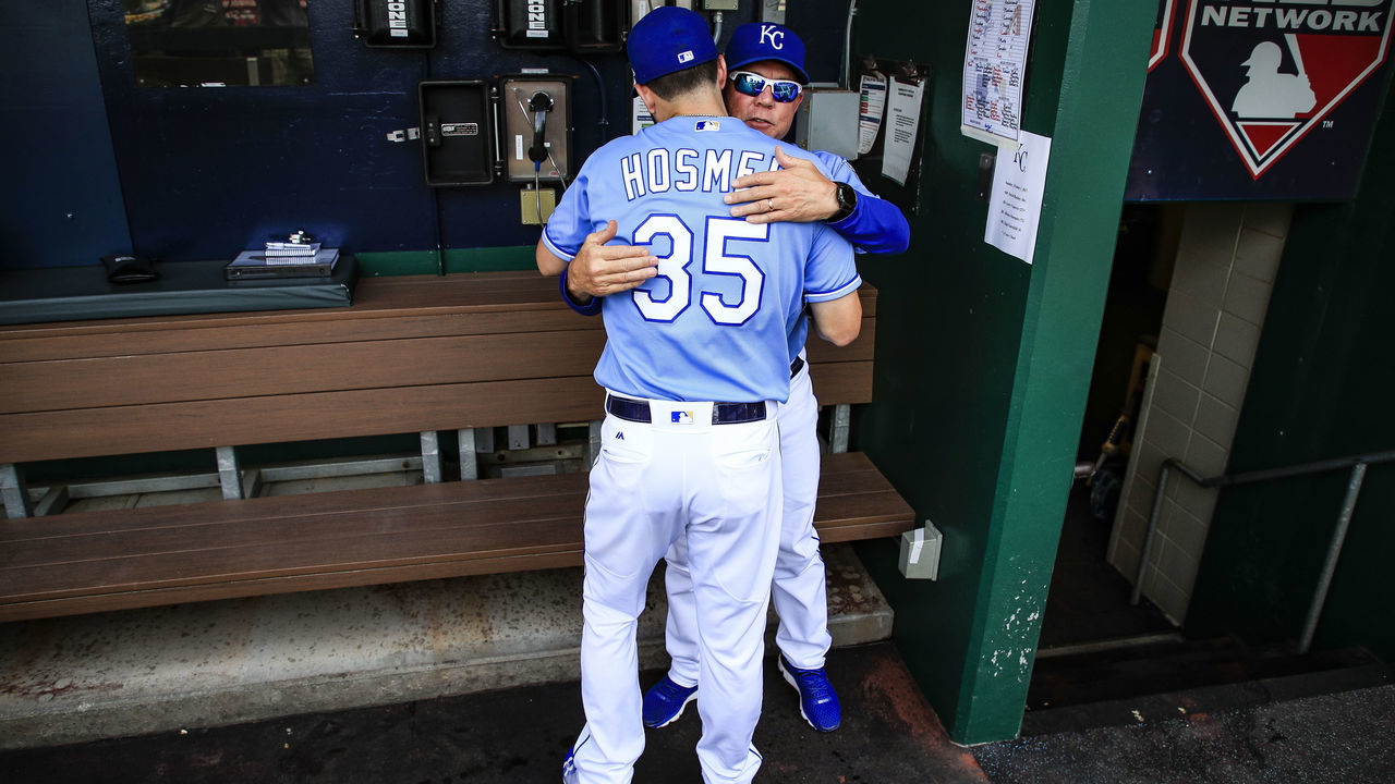 KANSAS CITY, MO - OCTOBER 01: Eric Hosmer hugs Manager Ned Yost #3 of the Kansas City Royals before the game against the Arizona Diamondbacks at Kauffman Stadium on October 1, 2017 in Kansas City, Missouri.