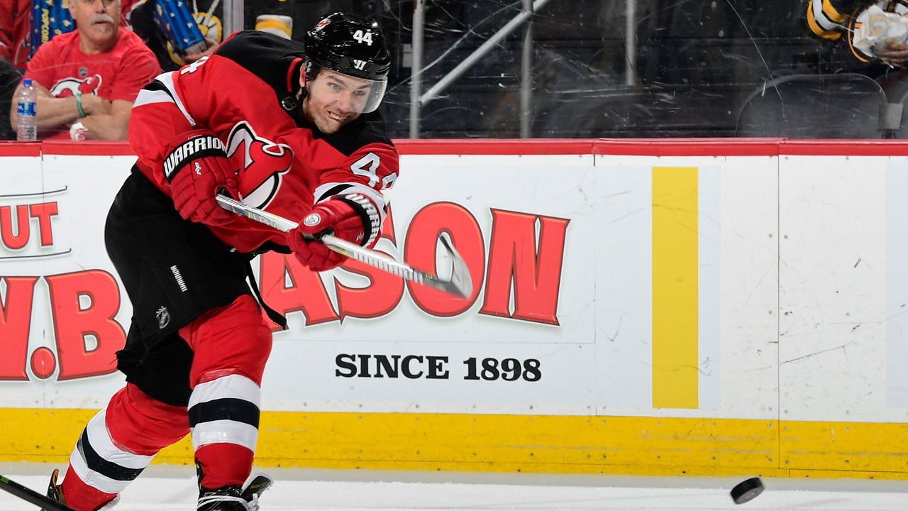 NEWARK, NJ - FEBRUARY 11: Miles Wood #44 of the New Jersey Devils takes a shot on goal during the second period against the Boston Bruins at Prudential Center on February 11, 2018 in Newark, New Jersey.