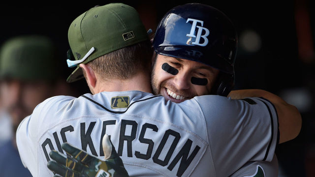 MINNEAPOLIS, MN - MAY 28: Corey Dickerson #10 of the Tampa Bay Rays congratulates teammate Evan Longoria #3 of the Tampa Bay Rays on a solo home run against the Minnesota Twins during the fifteenth inning of the game on May 28, 2017 at Target Field in Minneapolis, Minnesota. The Rays defeated the Twins 8-6 in fifteen innings.