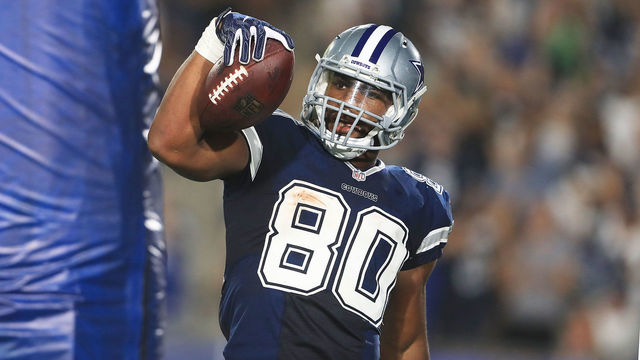 LOS ANGELES, CA - AUGUST 12: Rico Gathers #80 of the Dallas Cowboys celebrates after scoring a touchdown making the score 10-10 during the preseason game against the Los Angeles Rams at Los Angeles Memorial Coliseum on August 12, 2017 in Los Angeles, California.
