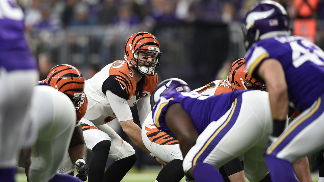 MINNEAPOLIS, MN - DECEMBER 17: AJ McCarron #5 of the Cincinnati Bengals at the line of scrimmage in the fourth quarter of the game against the Minnesota Vikings on December 17, 2017 at U.S. Bank Stadium in Minneapolis, Minnesota.