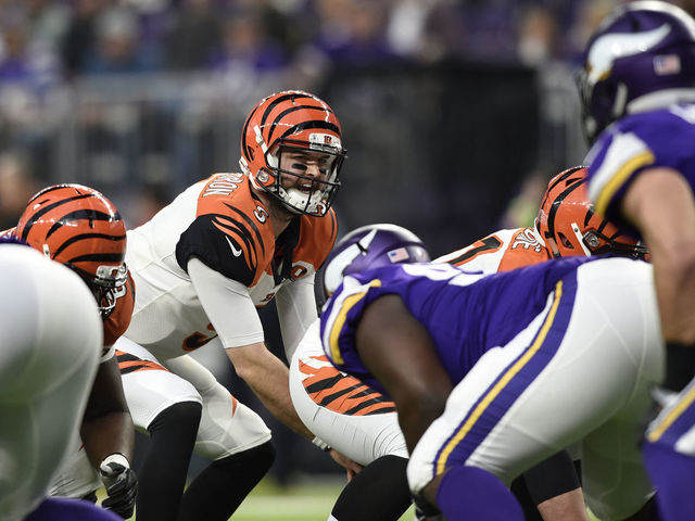 MINNEAPOLIS, MN - DECEMBER 17: AJ McCarron #5 of the Cincinnati Bengals at the line of scrimmage in the fourth quarter of the game against the Minnesota Vikings on December 17, 2017 at U.S. Bank Stadium in Minneapolis, Minnesota.