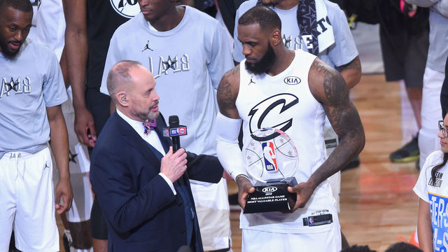 LOS ANGELES, CA - FEBRUARY 18: LeBron James #23 accepts the MVP award from TNT sportscaster Ernie Johnson Jr. during the NBA All-Star Game 2018 at Staples Center on February 18, 2018 in Los Angeles, California.