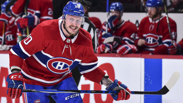 MONTREAL, QC - JANUARY 07: Nicolas Deslauriers #20 of the Montreal Canadiens squirts water from his mouth against the Vancouver Canucks during the NHL game at the Bell Centre on January 7, 2018 in Montreal, Quebec, Canada.