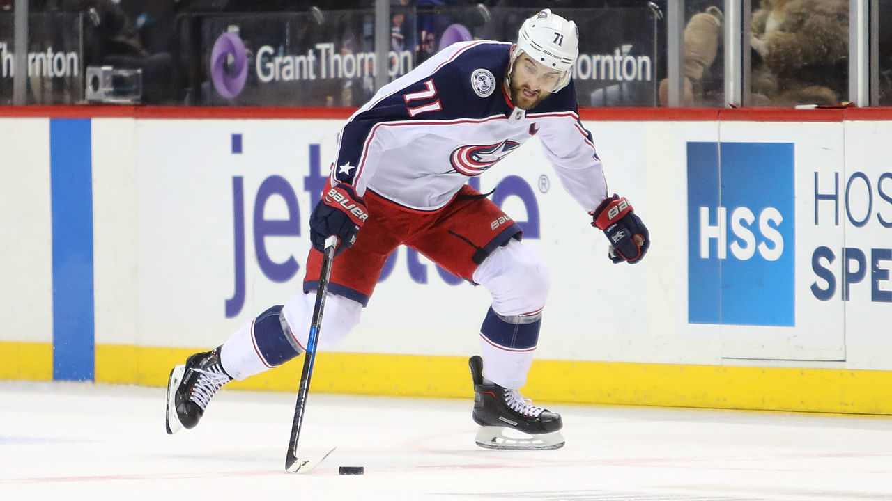 NEW YORK, NY - FEBRUARY 13: Nick Foligno #71 of the Columbus Blue Jackets skates with the puck in the first period against the New York Islanders during their game at Barclays Center on February 13, 2018 in the Brooklyn borough of New York City.