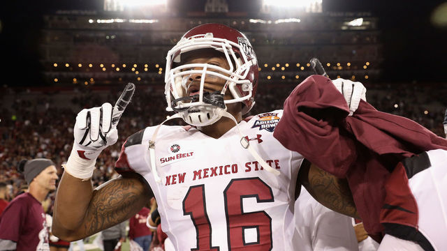 TUCSON, AZ - DECEMBER 29: Wide receiver Jaleel Scott #16 of the New Mexico State Aggies celebrates after winning in the Nova Home Loans Arizona Bowl game against the Utah State Aggies at Arizona Stadium on December , 29017 in Tucson, Arizona. The New Mexico State Aggies defeated the Utah State Aggies 26-20 in overtime.