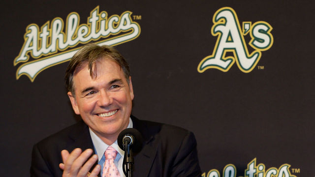 OAKLAND, CA - DECEMBER 18: Oakland Athletics vice president and general manager Billy Beane and Hiroyuki Nakajima of Japan joke with each other at a press conference where Beane introduced Nakajima to the Oakland Athletics at the O.co Coliseum on December 18, 2012 in Oakland, California. Nakajima signed a two-year contract through 2014 with a club option for 2015.