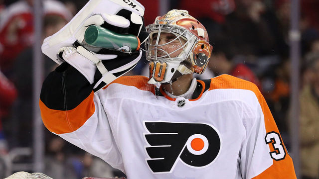 WASHINGTON, DC - DECEMBER 31: Goalie Michal Neuvirth #30 of the Philadelphia Flyers reacts after allowing a goal to Andre Burakovsky #65 of the Washington Capitals (not pictured) during the second period at Capital One Arena on December 31, 2018 in Washington, DC.