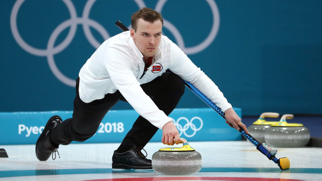 GANGNEUNG, SOUTH KOREA - FEBRUARY 13: Magnus Nedregotten of Norway delivers a stone against Olympic Athletes from Russia during the Curling Mixed Doubles Bronze Medal Game on day four of the PyeongChang 2018 Winter Olympic Games at Gangneung Curling Centre on February 13, 2018 in Gangneung, South Korea.