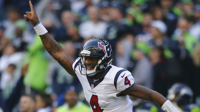 SEATTLE, WA - OCTOBER 29: Quarterback Deshaun Watson #4 of the Houston Texans cheers as DeAndre Hopkins #10 scores a 72 yard touchdown against the Seattle Seahawks in the fourth quarter at CenturyLink Field on October 29, 2017 in Seattle, Washington.
