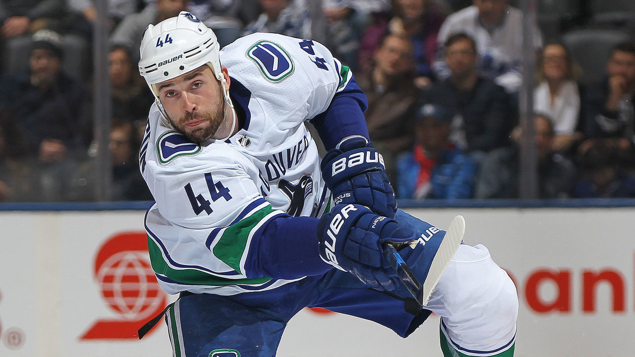 TORONTON, ON - JANUARY 6: Erik Gudbranson #44 of the Vancouver Canucks fires a puck in against the Toronto Maple Leafs during an NHL game at the Air Canada Centre on January 6, 2018 in Toronto, Ontario, Canada. The Maple Leafs defeated the Canucks 3-2 in an overtime shoot-out.