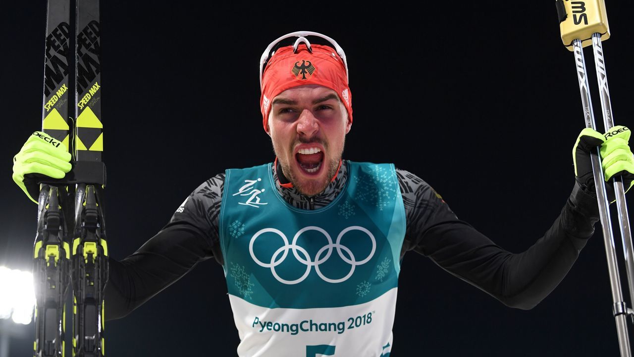Gold medallist Germany's Johannes Rydzek celebrates after the nordic combined individual Gundersen LH/10km cross country at the Alpensia Cross-Country Centre during the Pyeongchang 2018 Winter Olympic Games on February 20, 2018 in Pyeongchang / AFP PHOTO / Christof STACHE