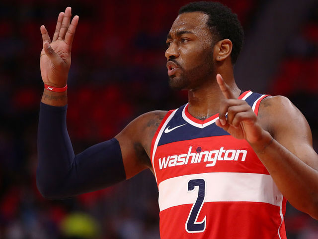 DETROIT, MI - JANUARY 19: John Wall #2 of the Washington Wizards calls a play while playing the Detroit Pistons during the second half at Little Caesars Arena on January 19, 2018 in Detroit, Michigan. Washington won the game 122-112.