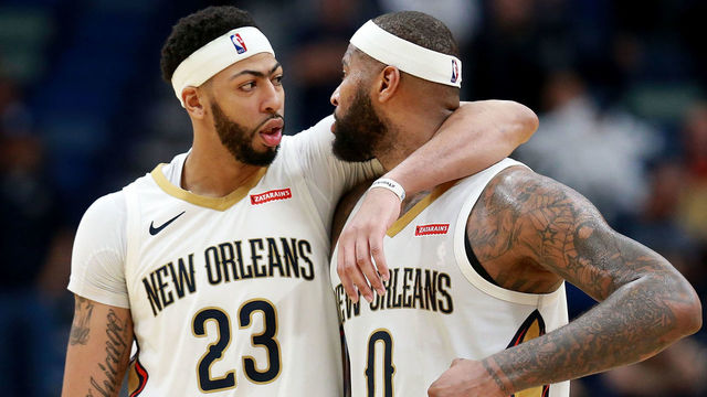 NEW ORLEANS, LA - JANUARY 22: Anthony Davis #23 of the New Orleans Pelicans and DeMarcus Cousins #0 of the New Orleans Pelicans walk of the court during a NBA game against the Chicago Bulls at the Smoothie King Center on January 22, 2018 in New Orleans, Louisiana.