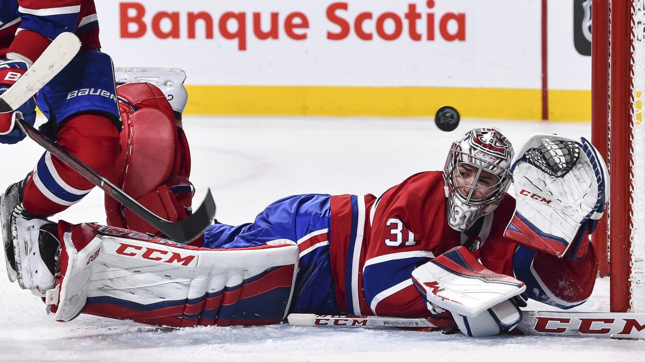 MONTREAL, QC - FEBRUARY 10: Goaltender Carey Price #31 of the Montreal Canadiens loses sight of the puck as he gets the glove up against the Nashville Predators during the NHL game at the Bell Centre on February 10, 2018 in Montreal, Quebec, Canada. The Nashville Predators defeated the Montreal Canadiens 3-2 in a shootout.