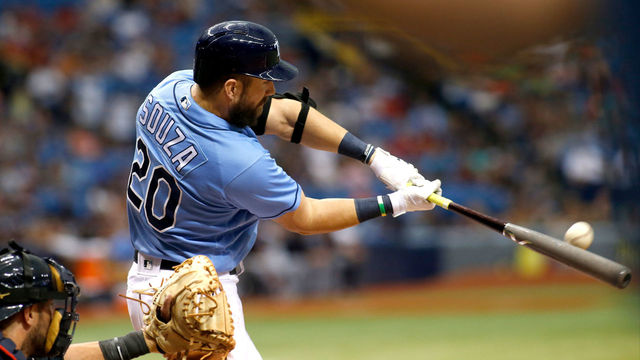 ST. PETERSBURG, FL - AUGUST 13: Steven Souza Jr. #20 of the Tampa Bay Rays hits a two-run home run off of pitcher Corey Kluber of the Cleveland Indians during the sixth inning of a game on August 13, 2017 at Tropicana Field in St. Petersburg, Florida.