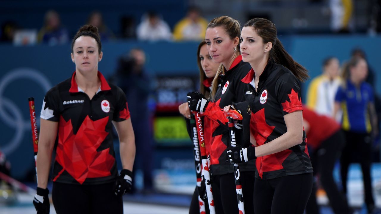Canada's players react during the curling women's round robin session between Canada and Britain during the Pyeongchang 2018 Winter Olympic Games at the Gangneung Curling Centre in Gangneung on February 21, 2018. / AFP PHOTO / WANG Zhao