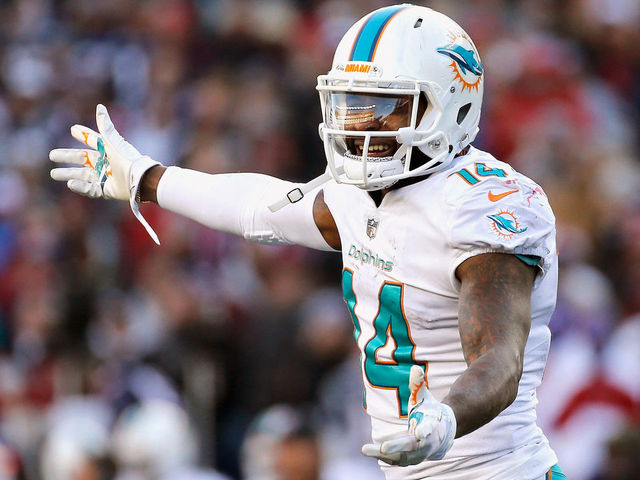 FOXBORO, MA - NOVEMBER 26: Jarvis Landry #14 of the Miami Dolphins reacts during the fourth quarter of a game against the New England Patriots at Gillette Stadium on November 26, 2017 in Foxboro, Massachusetts.