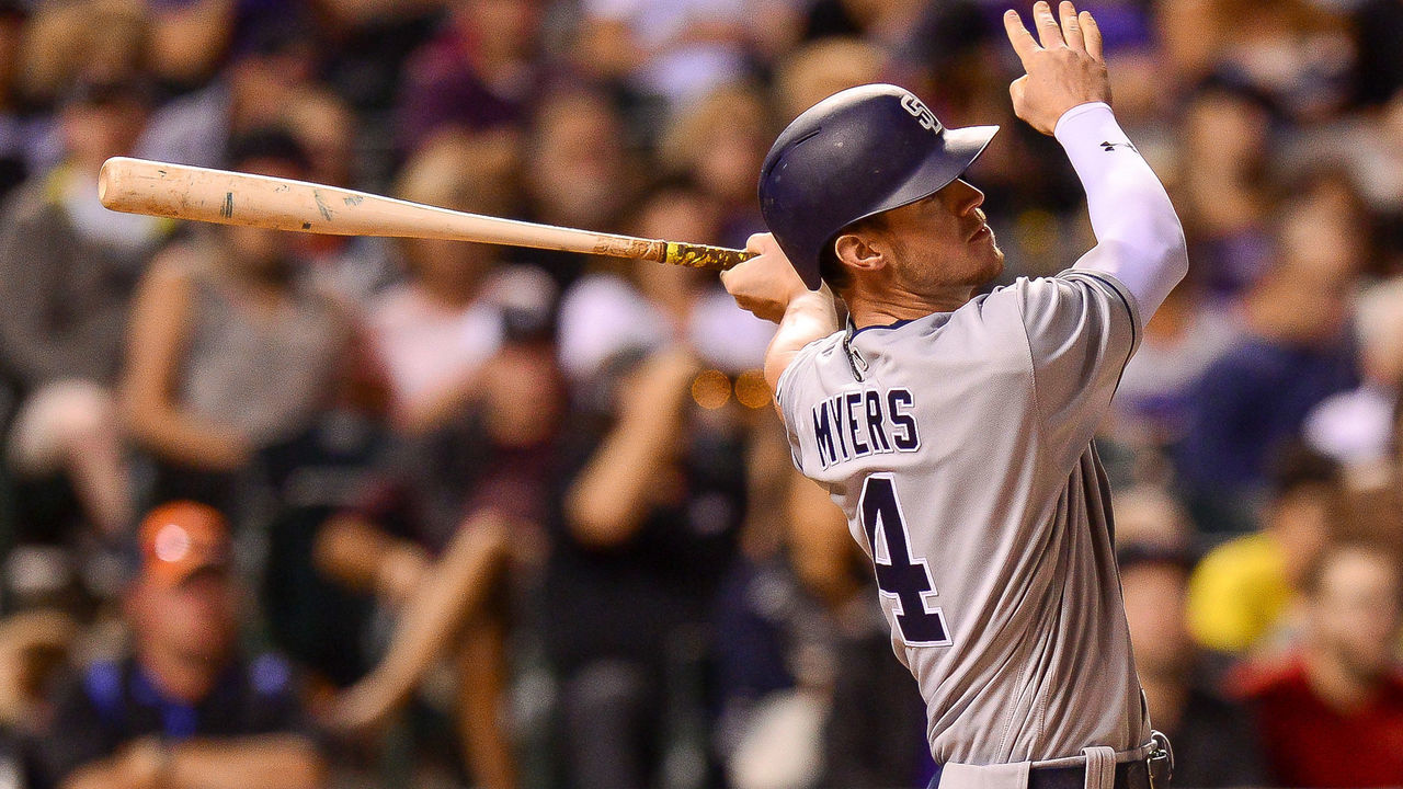 DENVER, CO - SEPTEMBER 15: Wil Myers #4 of the San Diego Padres watches the flight of a sixth inning solo homerun off of Tyler Chatwood #32 of the Colorado Rockies during a game at Coors Field on September 15, 2017 in Denver, Colorado.