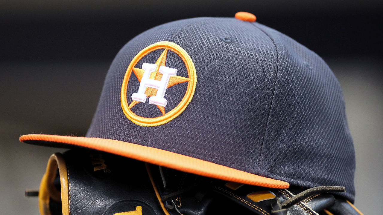MILWAUKEE, WISCONSIN - APRIL 10: Jose Altuve #27 of Houston Astros rests his hat and glove in the dugout before the game against the Milwaukee Brewers at Miller Park on April 10, 2016 in Milwaukee, Wisconsin.