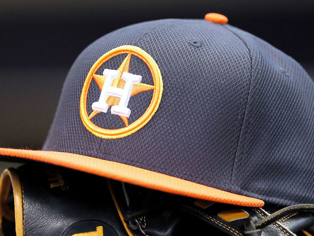 MILWAUKEE, WISCONSIN - APRIL 10: Jose Altuve #27 of Houston Astros rests his hat and glove in the dugout before the game against the Milwaukee Brewers at Miller Park on April 10, 2016 in Milwaukee, Wisconsin.
