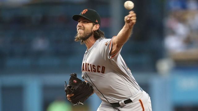 LOS ANGELES, CA - SEPTEMBER 23: Madison Bumgarner #40 of the San Francisco Giants throws a pitch in the second inning against the Los Angeles Dodgers at Dodger Stadium on September 23, 2017 in Los Angeles, California.