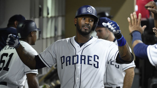 SAN DIEGO, CA - AUGUST 29: Jabari Blash #32 of the San Diego Padres is congratulated in the dugout after hitting a solo home run during the fourth inning of a baseball game against the San Francisco Giants at PETCO Park on August 29, 2017 in San Diego, California.
