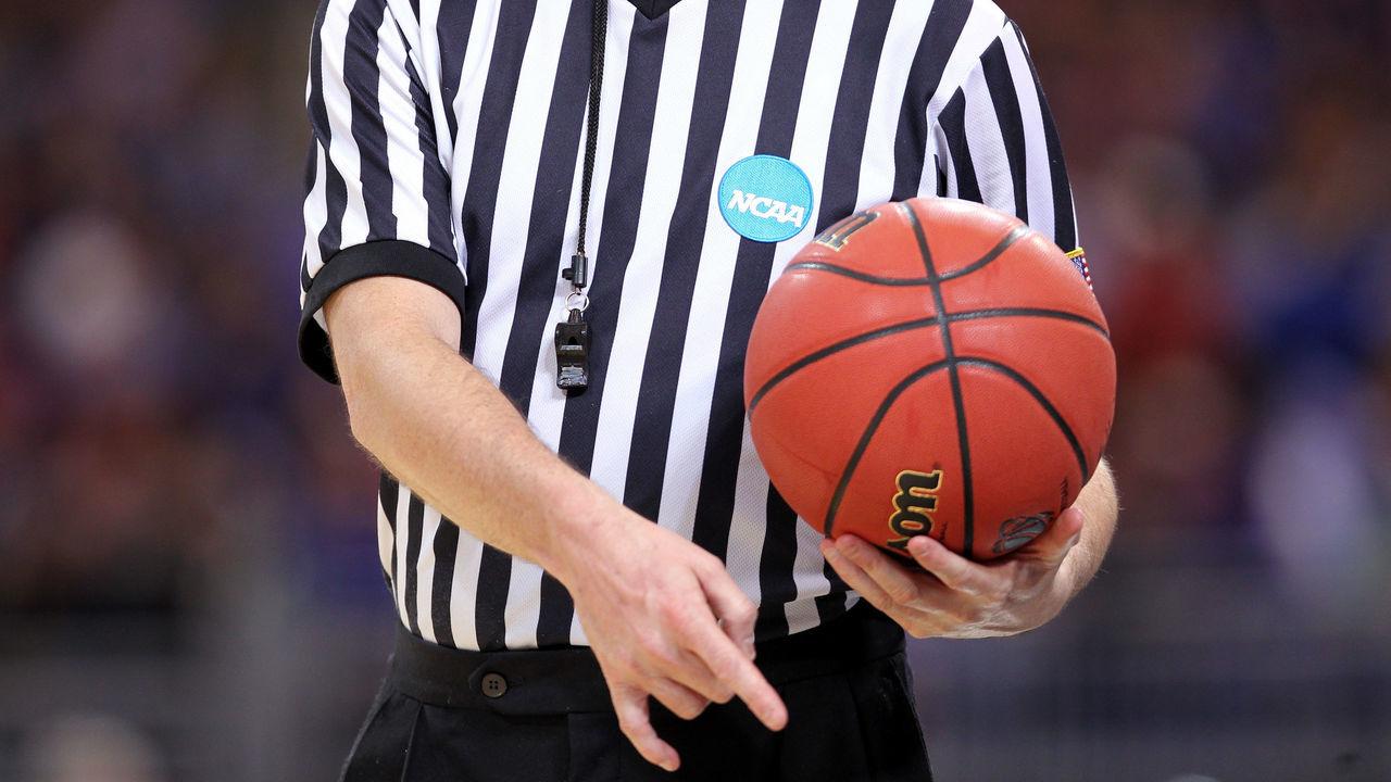 ST. LOUIS, MO - MARCH 23: : : A detail of an NCAA referee holding an official wilson NCAA tournament basketball as the North Carolina State Wolfpack play against the Kansas Jayhawks during the 2012 NCAA Men's Basketball Midwest Regional Semifinal at Edward Jones Dome on March 23, 2012 in St. Louis, Missouri.