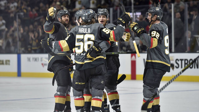 LAS VEGAS, NV - FEBRUARY 21: Tomas Nosek #92 celebrates his goal with Deryk Engelland #5, David Perron #57, Erik Haula #56 and Luca Sbisa #47 of the Vegas Golden Knights against the Calgary Flames during the game at T-Mobile Arena on February 21, 2018 in Las Vegas, Nevada.