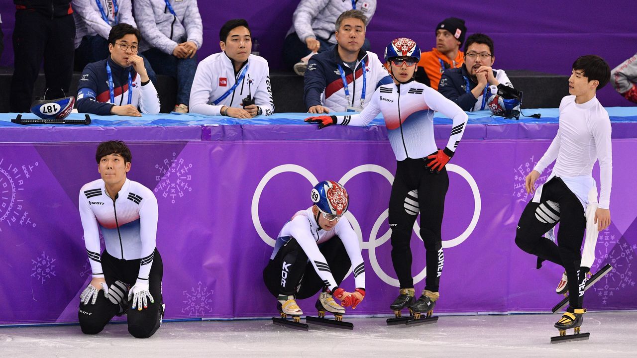 South Korea's team react after the men's 5,000m relay short track speed skating A final event during the Pyeongchang 2018 Winter Olympic Games, at the Gangneung Ice Arena in Gangneung on February 22, 2018. / AFP PHOTO / Mladen ANTONOV